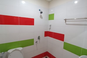 Deluxe Double Room | Bathroom | Shower, towels - Hotel O near Taman Sriwedari formerly In (Solo)