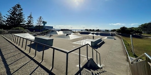 A skate park with various ramps and a fenced area. - Designer 4-Bed Coastal Home Walk To Beach & Shops (Maroubra)