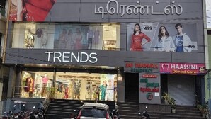A building with signage for 'SAI THAMIRA RESIDENCY' and 'VEDHANTH TOWERS'. - Hotel Royal Plazha (Chennai)
