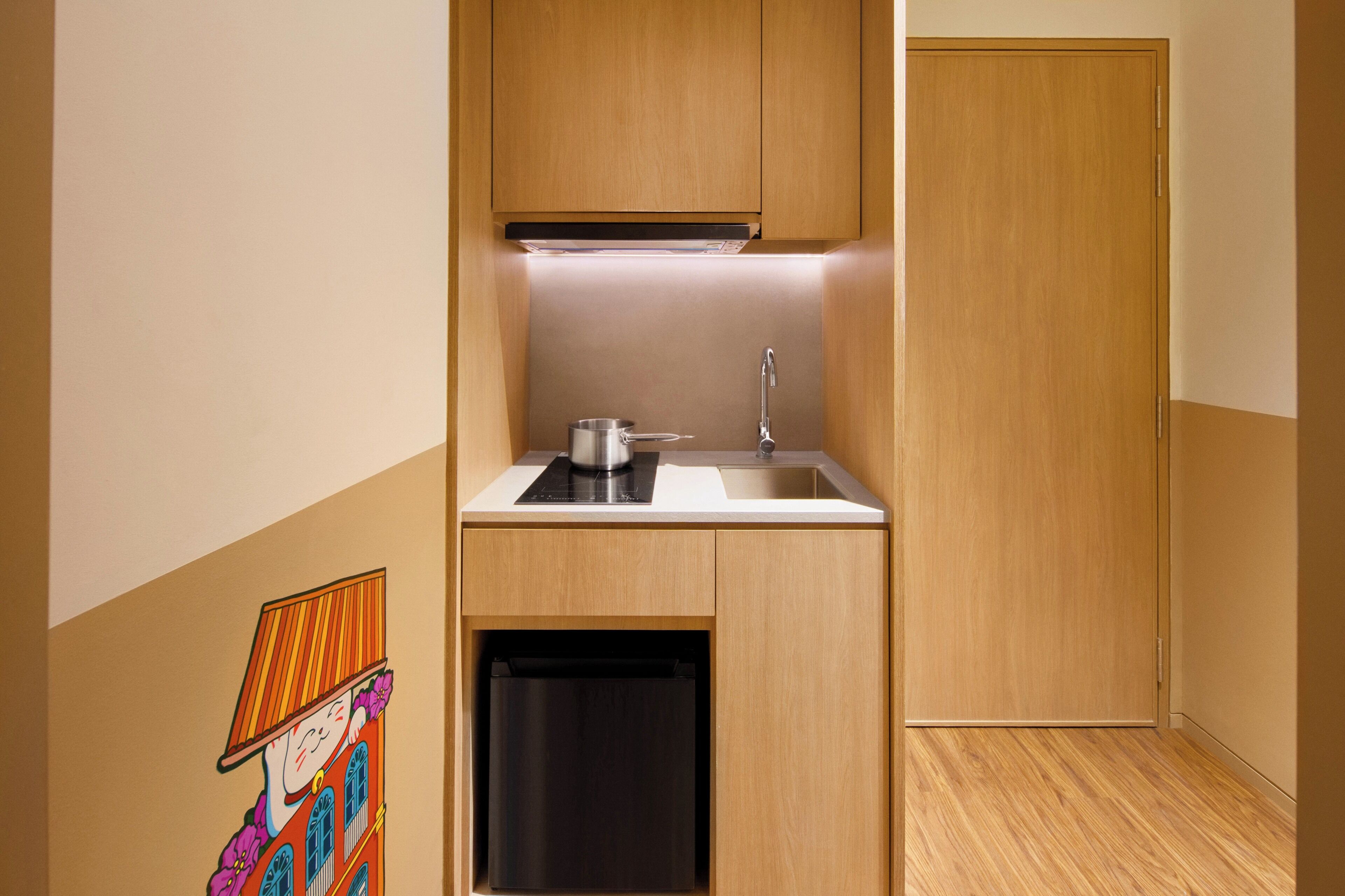 Coffee/tea maker, mini-fridge, shared microwave