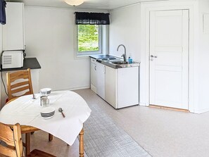 Fridge, microwave, cookware/dishes/utensils