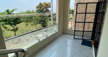 Spacious 4-bedroom villa in pleasant Vijayawada with AC
