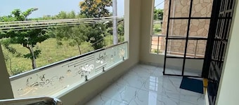 Spacious 4-bedroom villa in pleasant Vijayawada with AC