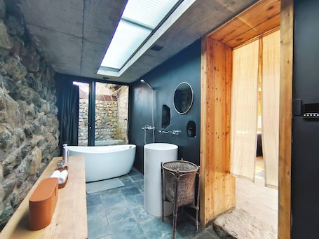 Shower, free toiletries, hair dryer, slippers. CMYK Stoneyards by the Great Wall