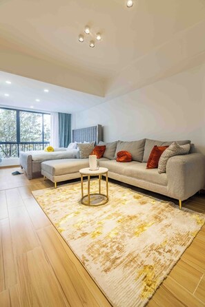 Smart TV - Chic Kilimani Sanctuary: Gold Accents & Urban Views (Nairobi)