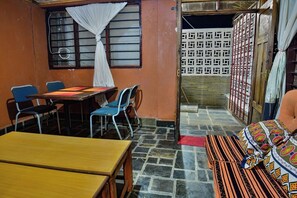 Family House, Balcony, Garden View | Living area | 24-inch Smart TV with digital channels - The Darad House Diani (Diani Beach)