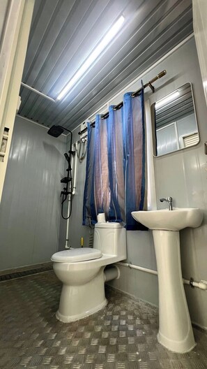Comfort Double or Twin Room, Partial Ocean View | Bathroom | Shower, towels, soap, shampoo - Crossa Inn Siquijor (siquijor)