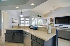 Fridge, microwave, stovetop, dishwasher - Cape Coral Lakefront Living! Home w/ Pool, Lanai (Cape Coral)