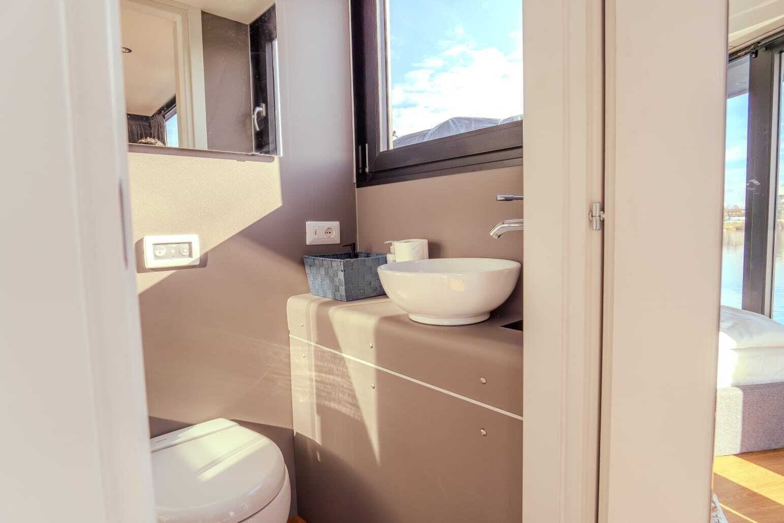 Mobile Home, River View | Bathroom | Shower, hair dryer, towels, soap