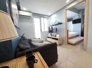 Iron/ironing board, Internet - Cozy 2-bedroom condo w/AC living room, balcony, Netflix walking dis to SM North (Quezon City)