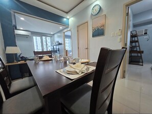Dining - Cozy 2-bedroom condo w/AC living room, balcony, Netflix walking dis to SM North (Quezon City)