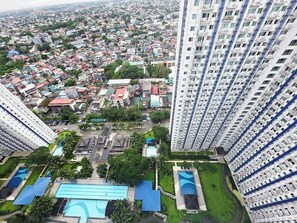 Exterior - Cozy 2-bedroom condo w/AC living room, balcony, Netflix walking dis to SM North (Quezon City)