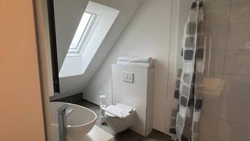 Superior Apartment, Balcony | Bathroom | Shower, hair dryer, towels, soap