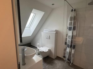 Superior Apartment, Balcony | Bathroom | Shower, hair dryer, towels, soap