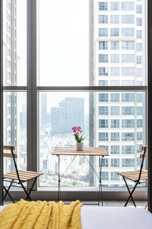 Deluxe Apartment, 1 Bedroom, City View | Desk, laptop workspace, blackout drapes, soundproofing - The Kingston Landmark 81 Sky Residence (Thanh My Tay)