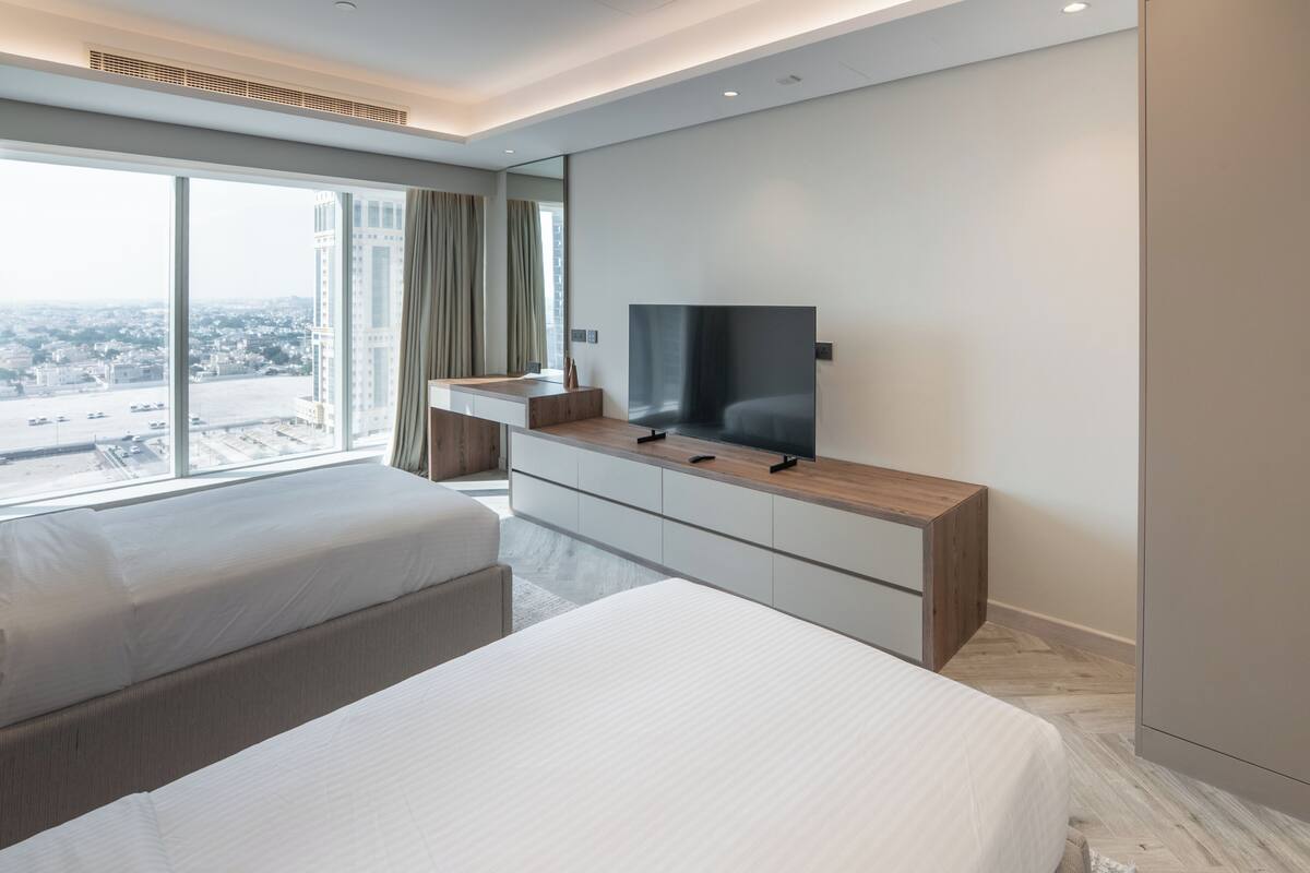 Minibar, desk, laptop workspace, iron/ironing board