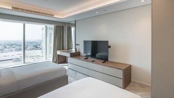 Minibar, desk, laptop workspace, iron/ironing board