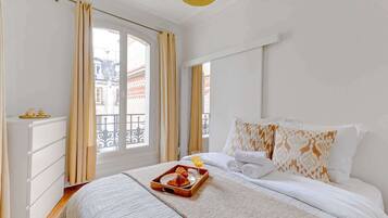 1 bedroom, desk, iron/ironing board, travel cot