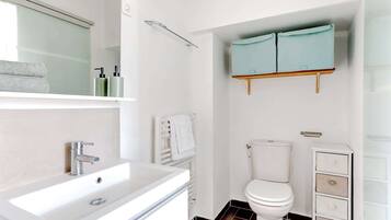 Shower, hair dryer, towels, soap