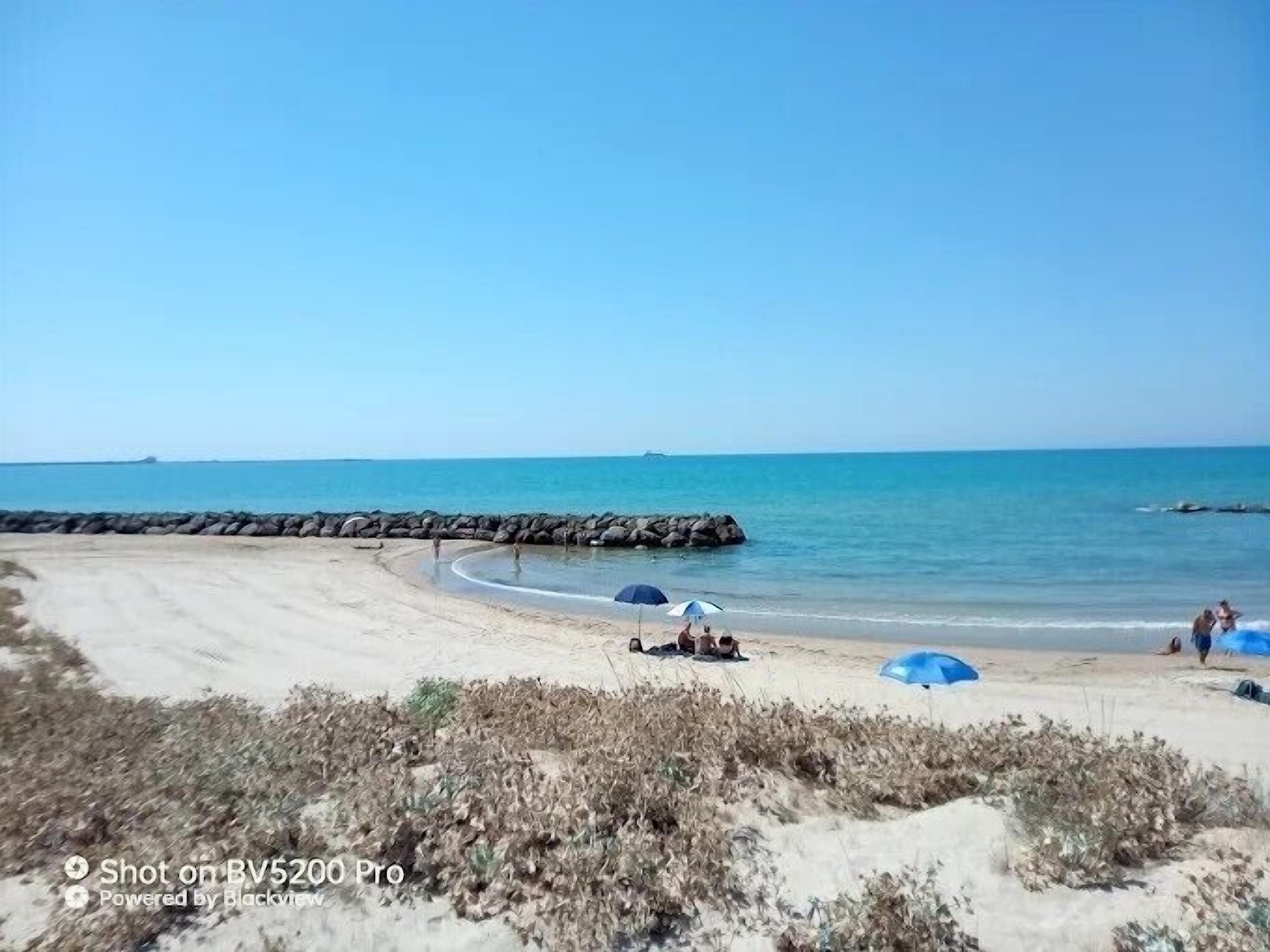 En la playa, arena blanca