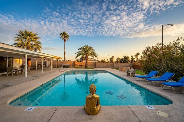 Evening hits different out here - the pool is glowing, the hot tub is calling, and the backyard turns into the perfect spot for splashing, laughing, grilling, and keeping the vacation energy going.