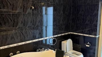 Basic Triple Room, Balcony, City View | Bathroom | Hair dryer, towels