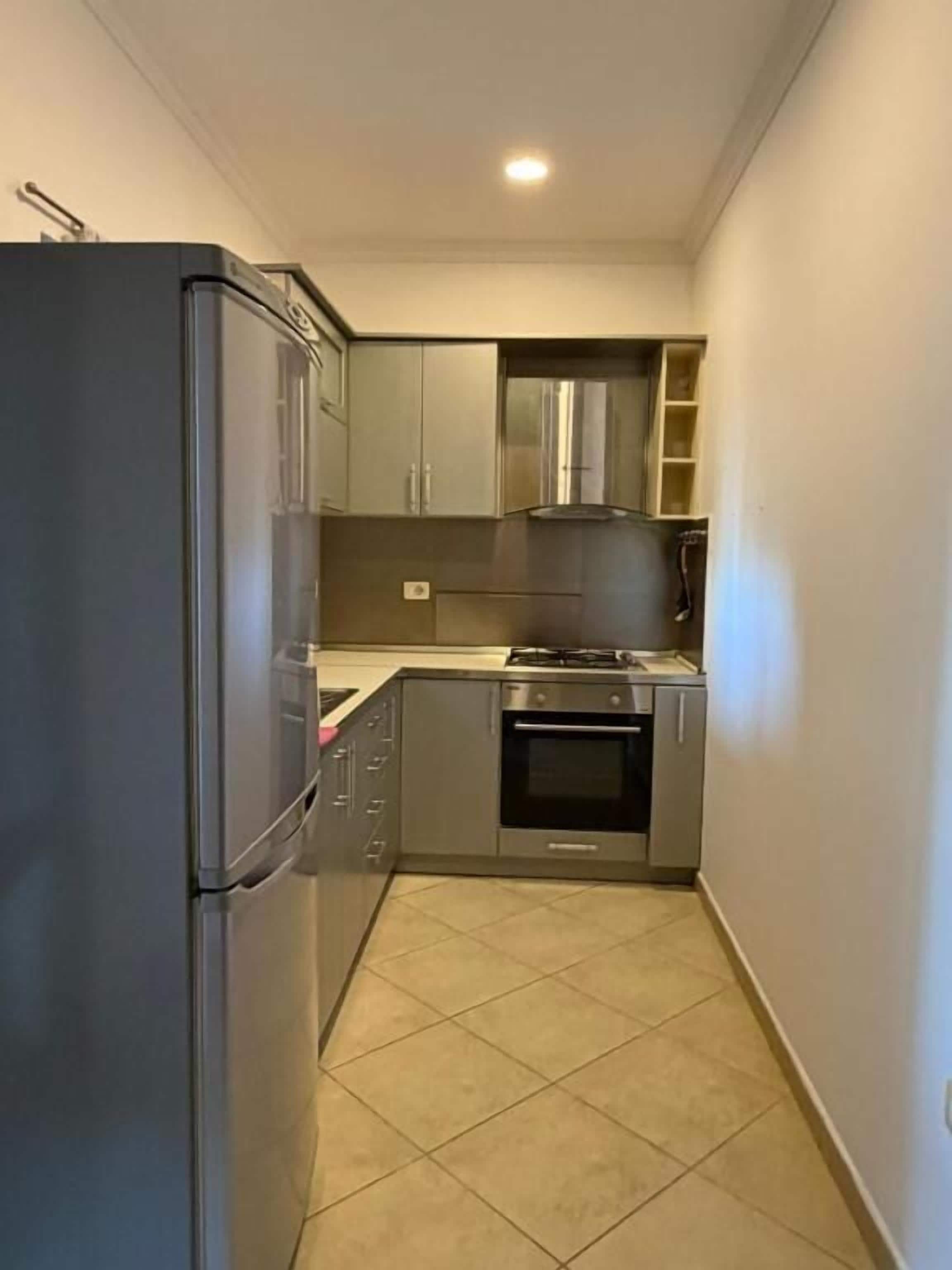 Mini-fridge, microwave, oven, cookware/dishes/utensils