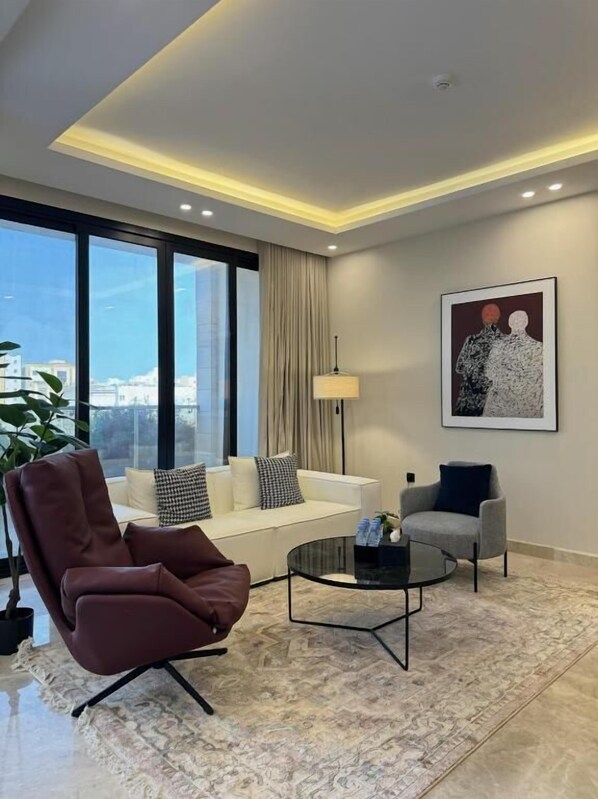 Appartement supérieur, balcon | Aire de séjour