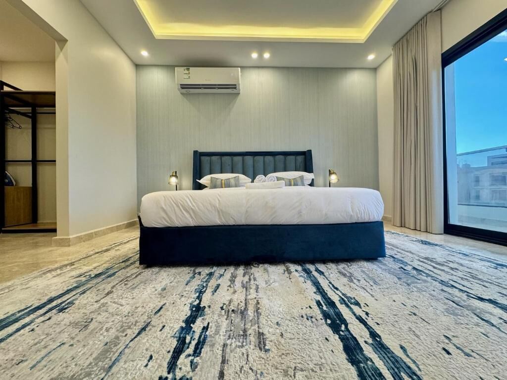 Deluxe appartement, balkon | Een strijkplank/strijkijzer, gratis wifi