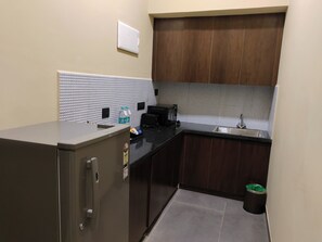 Luxury Penthouse, Balcony, Mountain View | Private kitchen | Mini-fridge, dining tables