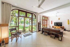 Classic Apartment | Living area | 24-inch Smart TV with digital channels - Simba Village Apartments Diani (Msambweni)