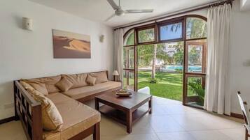Classic Apartment | Living area | 24-inch Smart TV with digital channels
