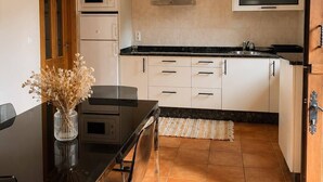 Superior Apartment, 2 Bedrooms | Private kitchen | Mini-fridge, microwave, stovetop, cookware/dishes/utensils