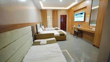 Family Room, Balcony, City View | In-room safe, desk, free WiFi, wheelchair access