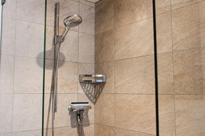 Jetted bath, hair dryer, towels, toilet paper