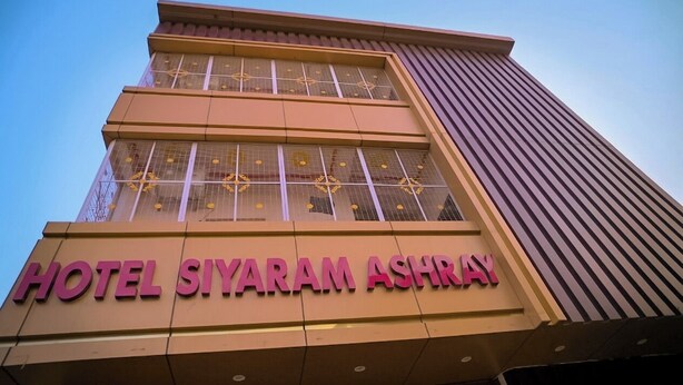A hotel building with the name 'HOTEL SIYARAM ASHRAY' prominently displayed. - HOTEL SIYARAM ASHRAY (Faizabad)