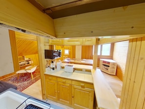 Fridge, microwave, stovetop, coffee/tea maker