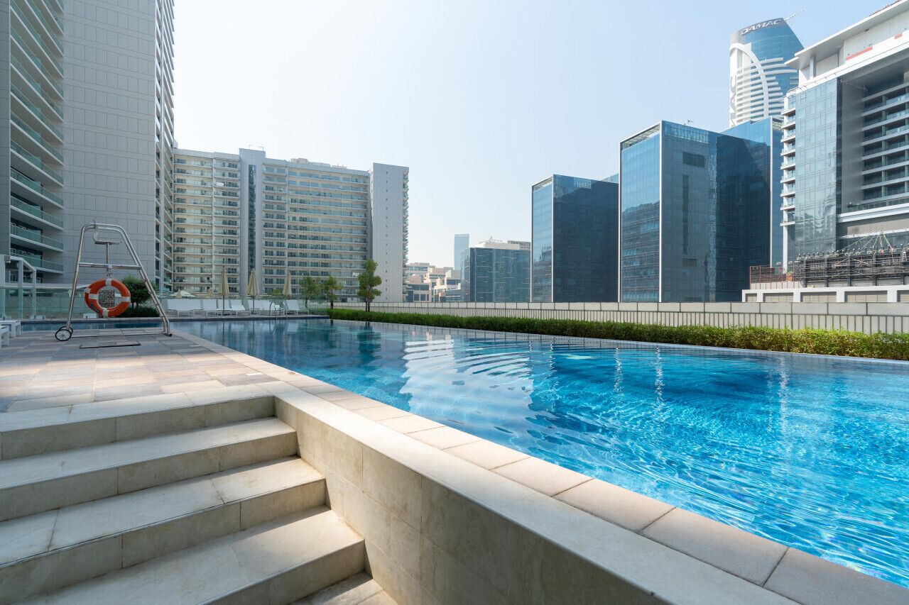 2 outdoor pools, open 8:00 AM to 10:00 PM, pool umbrellas, pool loungers