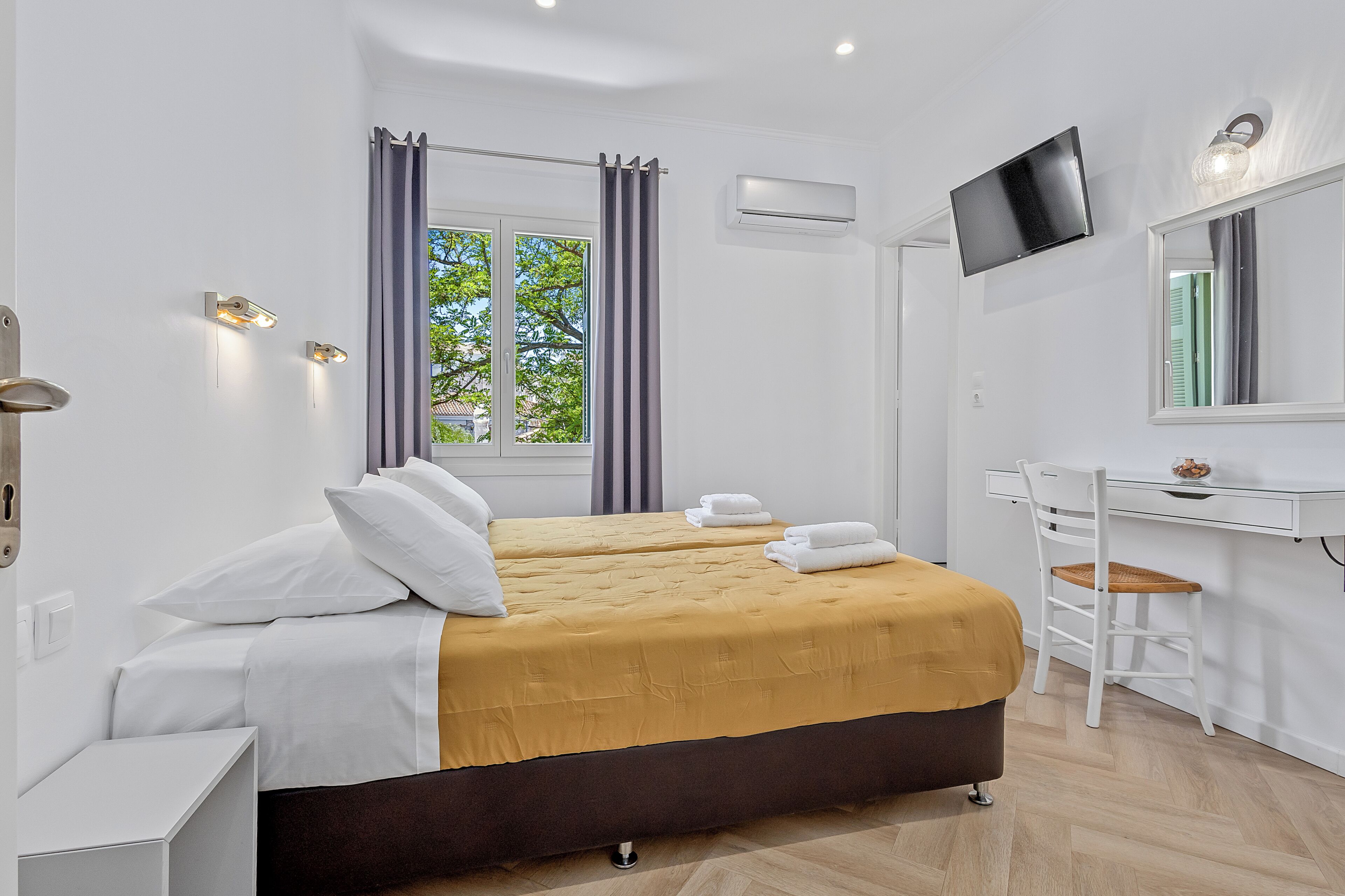 Twin Room, Garden View | Minibar, desk, free WiFi, bed sheets