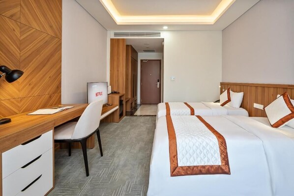 Deluxe Double or Twin Room, City View | In-room safe, desk, laptop workspace, soundproofing - Tao Dan Hotel (Ho Chi Minh)