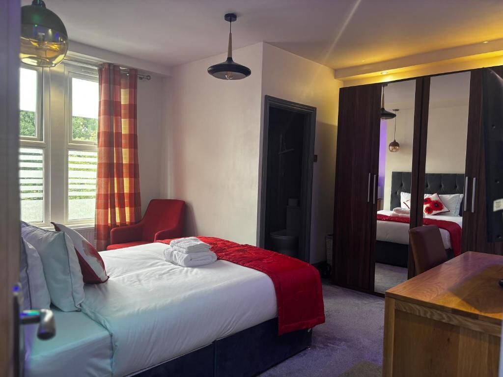 Executive Suite, Garden View | Soundproofing, iron/ironing board, free WiFi