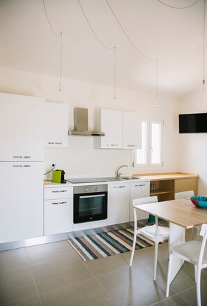 Fridge, oven, stovetop, coffee/tea maker - Macondo Agriliving - First Floor Apartment (Castiadas)