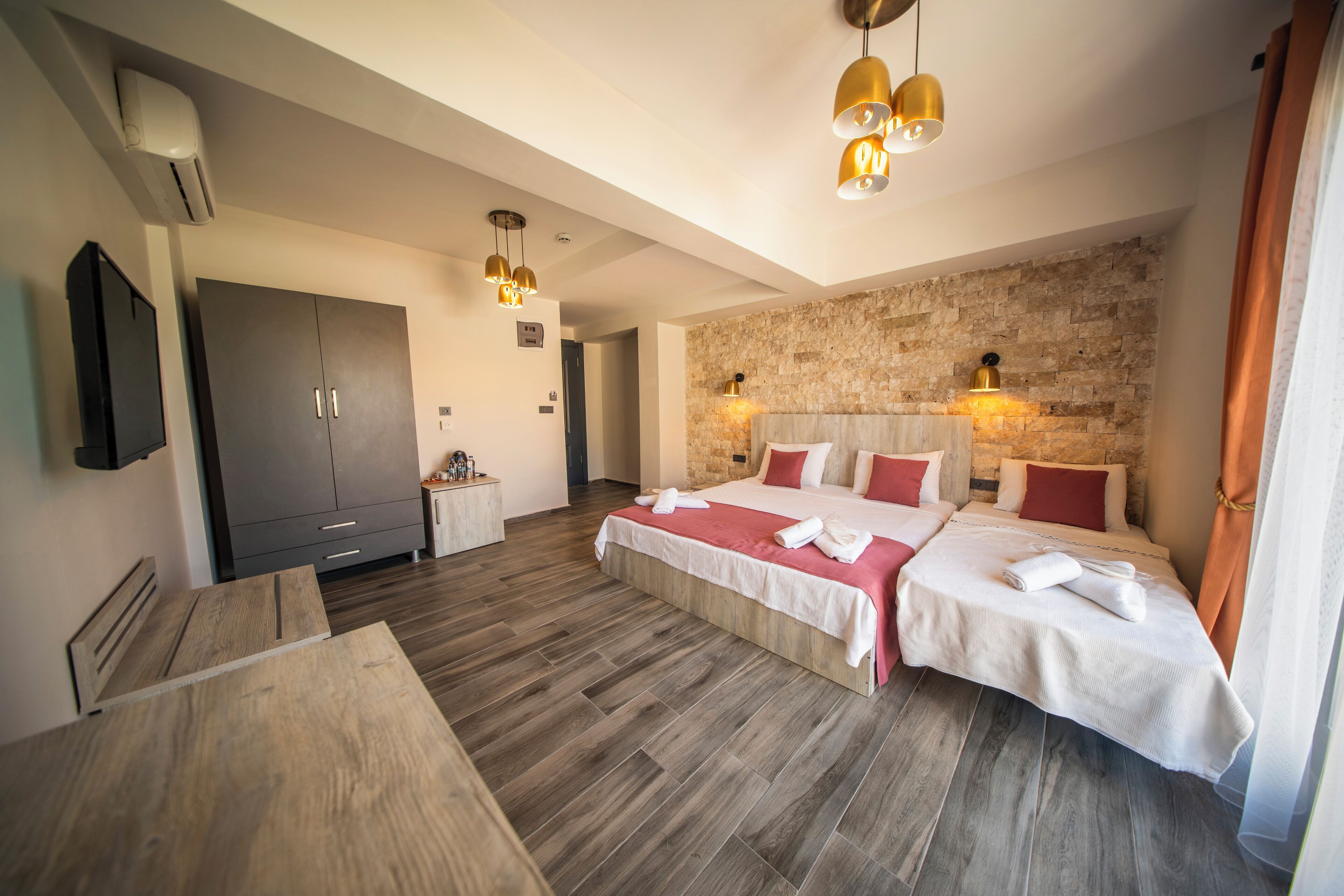 Deluxe Triple Room, Pool View | Minibar, free WiFi, bed sheets
