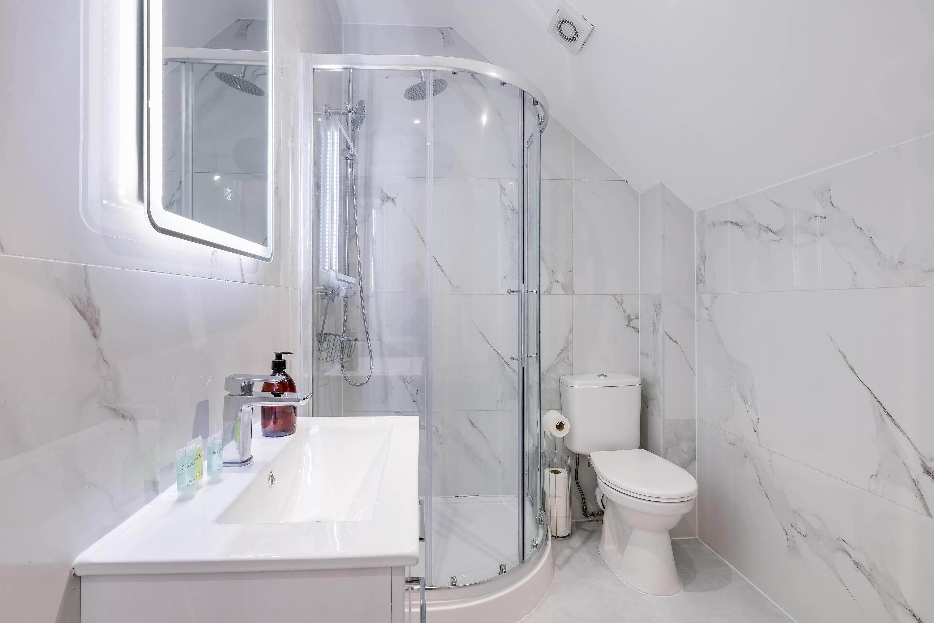 Shower, hair dryer, soap, shampoo