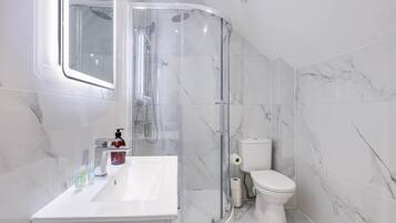 Shower, hair dryer, soap, shampoo