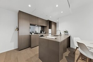 Fridge, microwave, oven, stovetop - Wellness & Style 2BR2BA Apt Mel MSQ+Gym (Southbank)