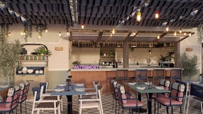 Outdoor dining - Moxy Hotel St Julian's Malta (San Ġiljan)