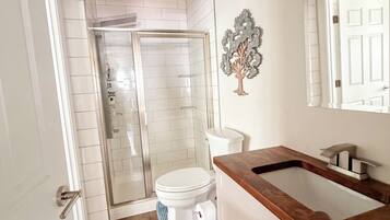 Shower, towels, soap, shampoo