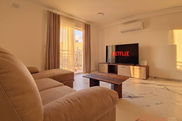 Living room with AC and smart TV