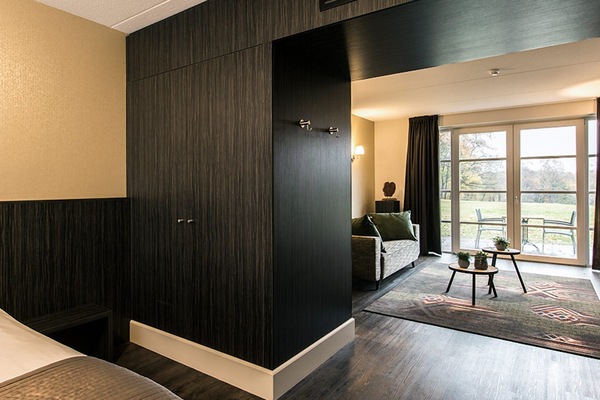Unwind in a stylish suite with calming garden views.